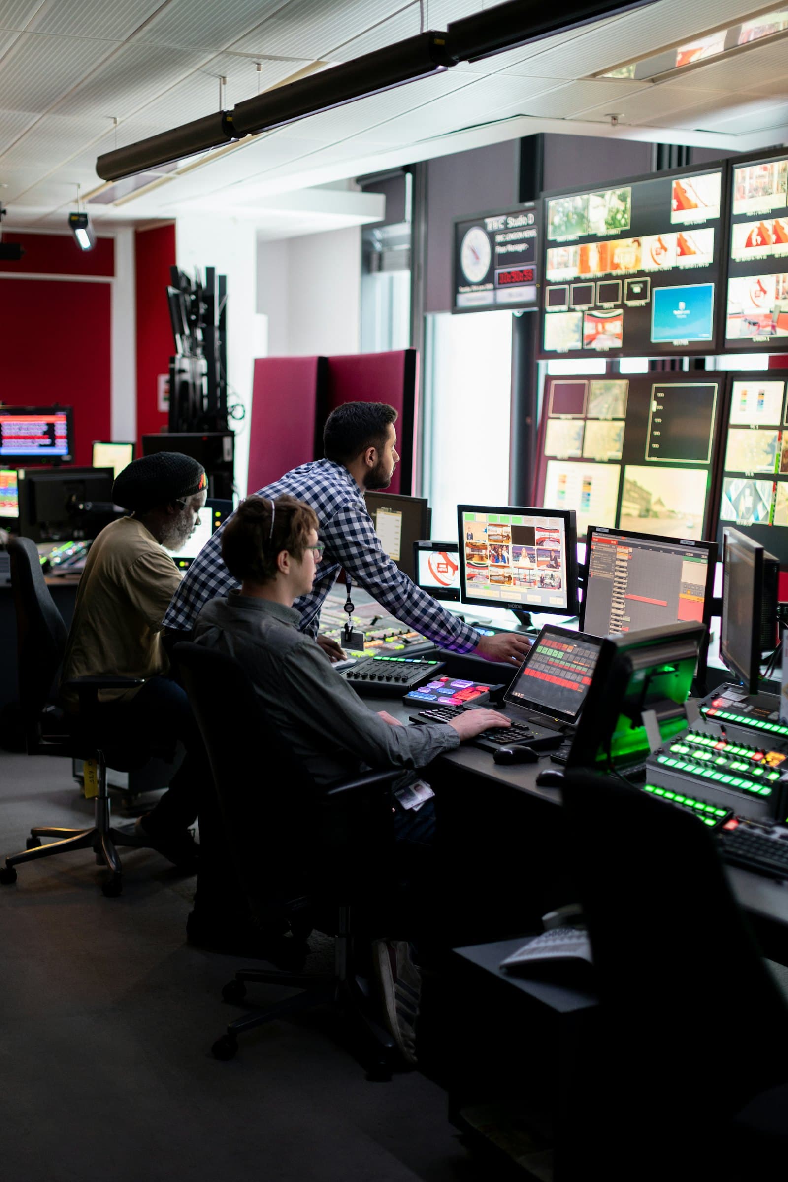 Industrial control room with monitoring screens